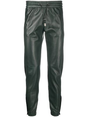 Saint Laurent leather tapered-leg trousers - Green