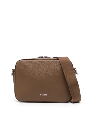 SANDRO embossed-logo leather messenger bag - Brown
