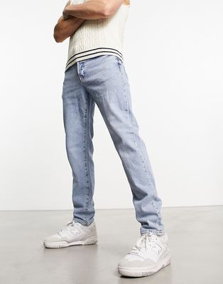 Selected Homme slim fit tapered jeans in light wash-Blue