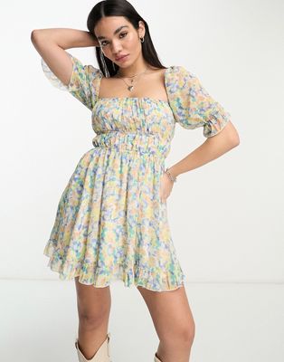 Sisters of the Tribe mini milkmaid dress with shirred waist and open waist in blue ditsy floral
