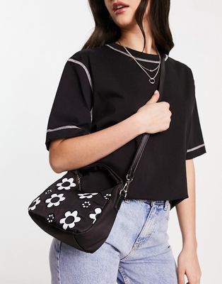 Skinnydip London festival daisy quilted nylon mini crossbody bag in black
