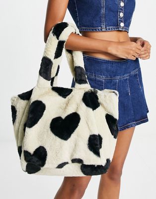 Skinnydip plush faux fur tote bag in beige with black heart print-Neutral