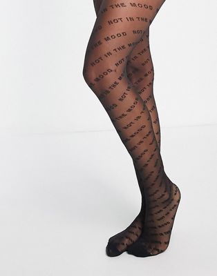 Skinnydip sheer black tights with 'not in the mood' wavy slogan print