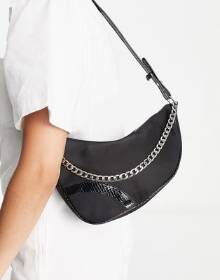 Skinnydip shoulder bag in black nylon with patent trim and silver chain