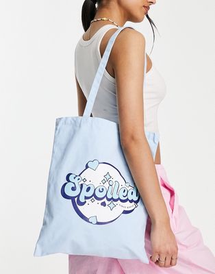 Skinnydip Spoiled slogan tote bag in baby blue