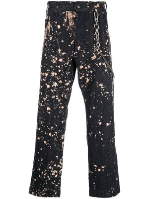 Song For The Mute paint-splatter print trousers - Black
