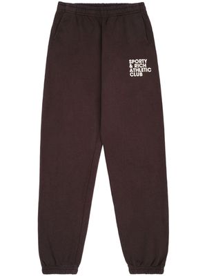 Sporty & Rich Exercise Often logo-print track pants - Brown