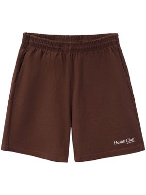 Sporty & Rich Health Club logo-print shorts - Brown