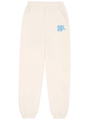 Sporty & Rich slogan-print cotton track pants - CREAM