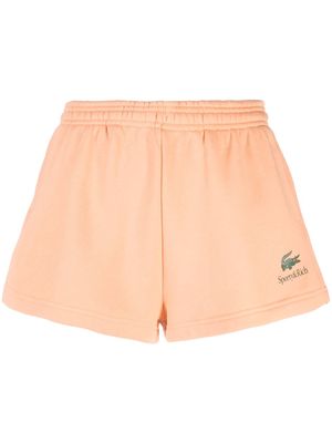 Sporty & Rich x Lacoste cotton track shorts - Orange