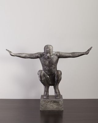 Squatting Man Sculpture