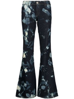 Stain Shade tie-dye flared trousers - Blue