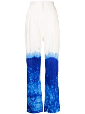 Stain Shade tie-dye wool suit trousers - White