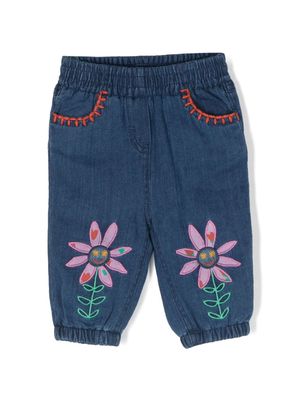 Stella McCartney Kids floral-embroidered tapered-leg jeans - Blue