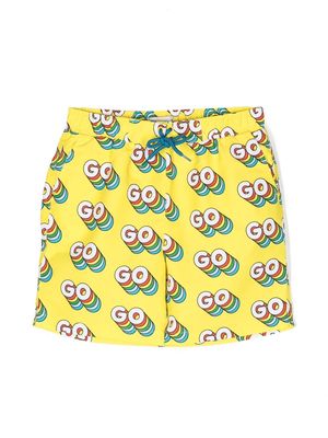 Stella McCartney Kids Go print swimming shorts - Yellow