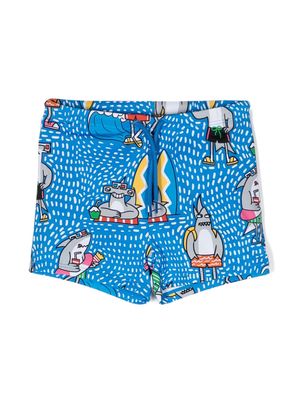 Stella McCartney Kids shark friends-print swim shorts - Blue