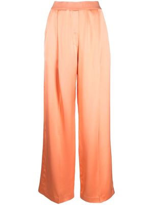Stine Goya logo-waist satin-finish trousers - Orange