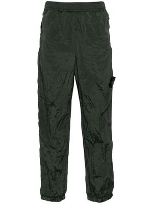 Stone Island Compass-badge shell tapered pants - Green