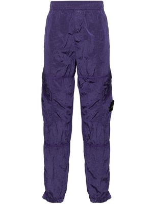 Stone Island Compass-badge tapered track pants - Purple