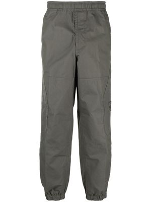 Stone Island Compass-motif cotton tapered trousers - Grey
