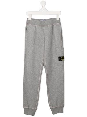 Stone Island Junior logo patch track pants - Grey