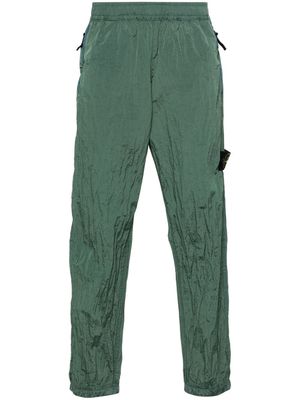 Stone Island metallic tapered track pants - Green