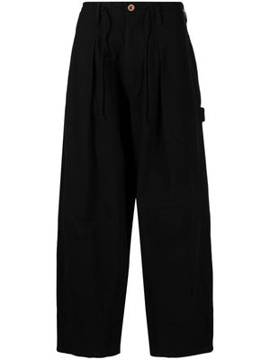 STORY mfg. patchwork-detailing organic cotton trousers - Black