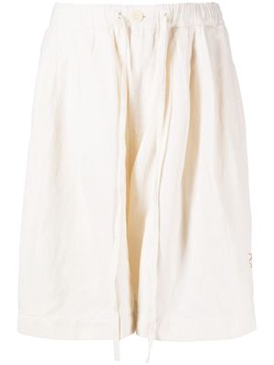 STORY mfg. pumpkin-embroidered organic-cotton shorts - White