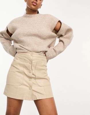 Stradivarius faux leather mini skirt with button front in beige-Neutral