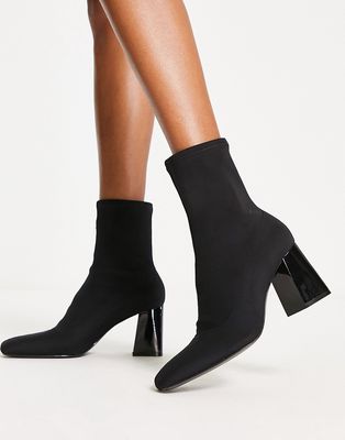 Stradivarius heeled ankle sock boot in black