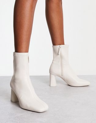 Stradivarius mid heel sock boot in white