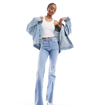 Stradivarius Tall flare jeans with split in light wash blue