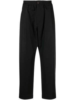 Studio Nicholson Gentile cotton-blend tapered-leg trousers - Black