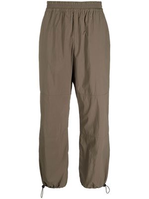 Studio Nicholson loose-fit elasticated-waist trousers - Green