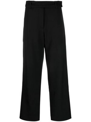 Studio Nicholson virgin wool wide-leg trousers - Black