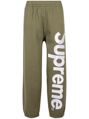 Supreme satin logo-appliqué track pants - Green