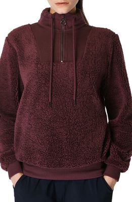 Sweaty Betty Faux Shearling Quarter Zip Pullover in Umbra Red