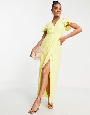 TFNC Bridesmaid chiffon wrap front maxi dress with flutter sleeve in lemon yellow