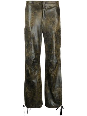 THE ANDAMANE distressed-effect tapered trousers - Black