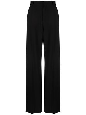 THE ANDAMANE flared high-waisted trousers - Black