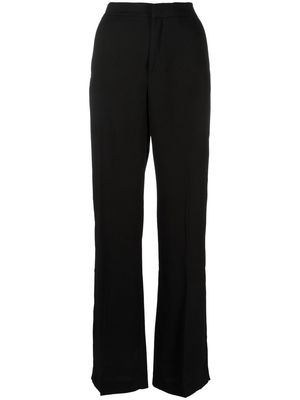 THE ANDAMANE high-waisted wide-leg trousers - Black