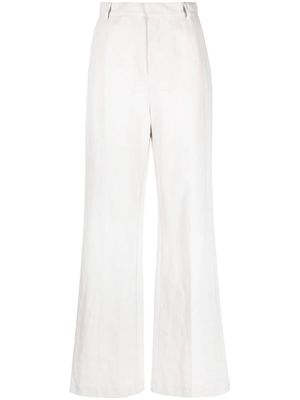 THE ANDAMANE pressed-crease palazzo trousers - Neutrals