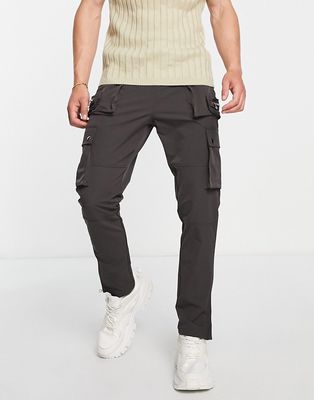 The Couture Club cargo pants in gray with multiple zips