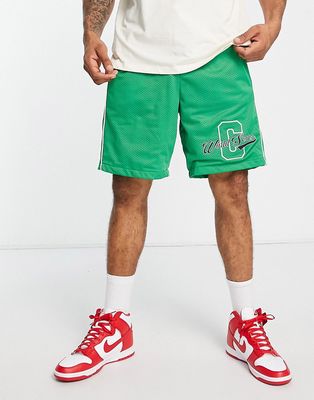 The Couture Club mesh varsity shorts in green with racer print - part of a set