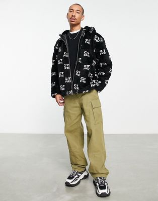 The Couture Club oversized hooded fur jacket in black with CTRE all-over print