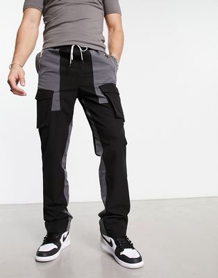The Couture Club paneled cargo pants in black