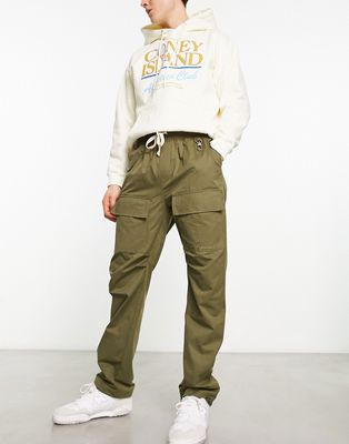 The Couture Club utility cargo pants in olive green
