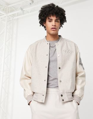 The Couture Club varsity bomber jacket with embroided patches in cream-Neutral