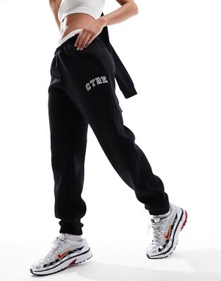 The Couture Club varsity relaxed sweatpants in black