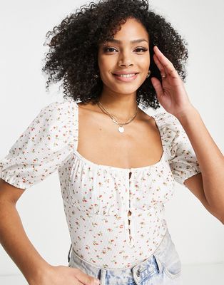 The Frolic ditsy floral pique bodysuit in white